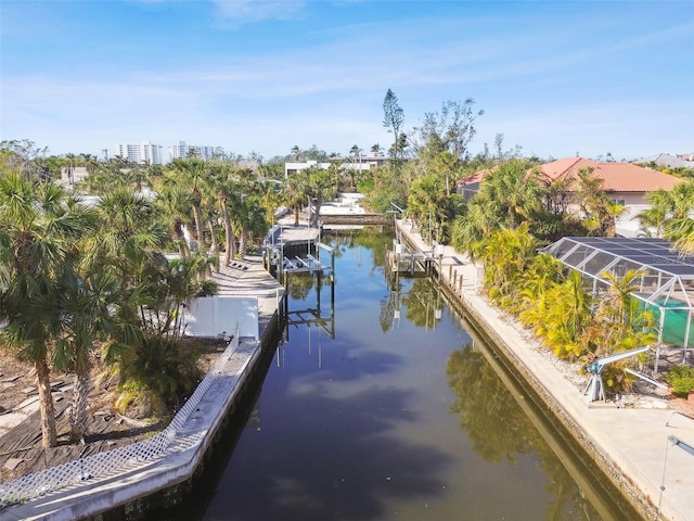 dock area featuring a water view and a lanai