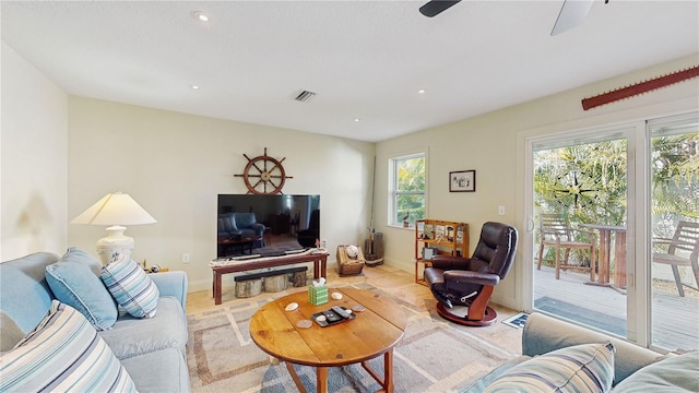 living room featuring ceiling fan