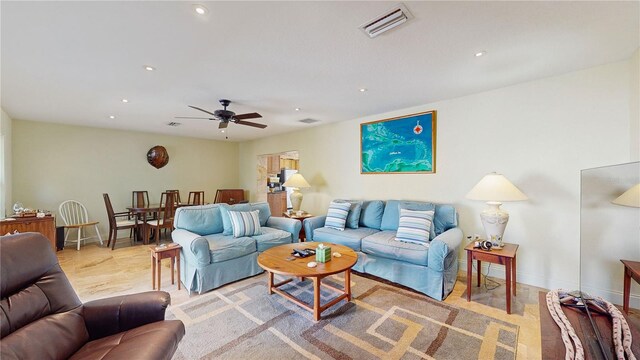 living room featuring ceiling fan