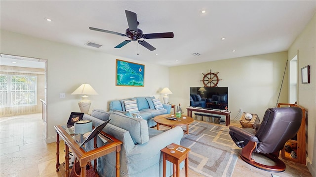 living room featuring ceiling fan