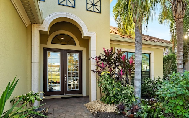 doorway to property with french doors