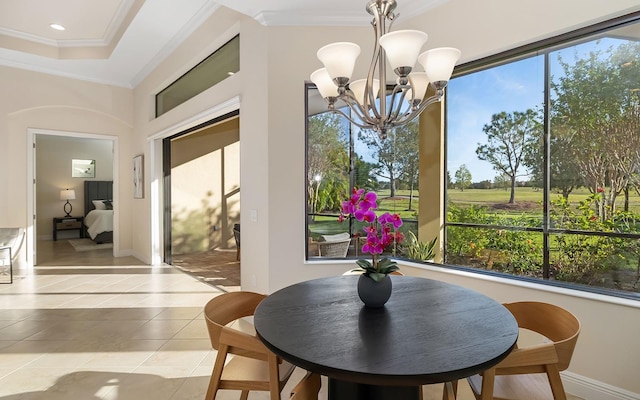 interior space with a wealth of natural light and a notable chandelier