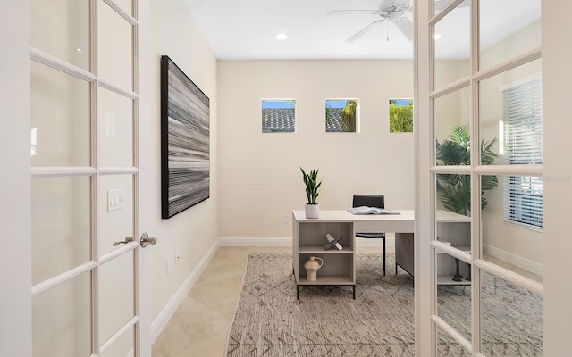 office space featuring ceiling fan, plenty of natural light, and french doors