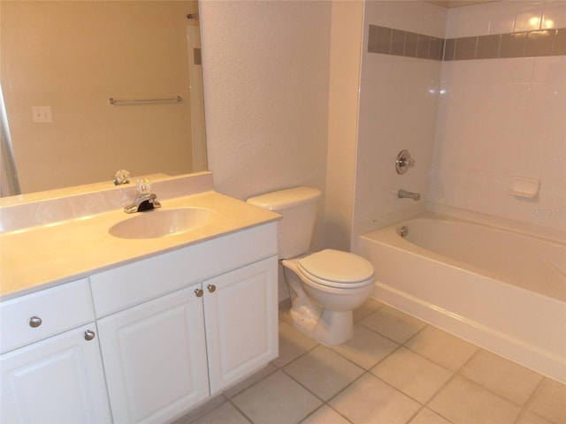 full bathroom featuring tile patterned floors, vanity, toilet, and tiled shower / bath combo