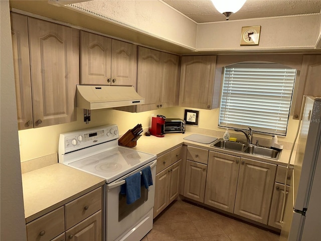 kitchen with white appliances, sink, tile patterned flooring, a textured ceiling, and light brown cabinetry