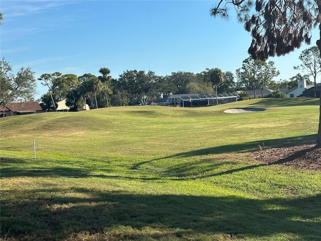 view of home's community featuring a lawn