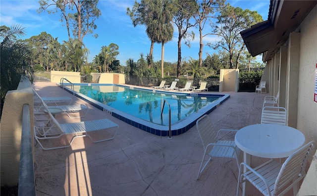 view of pool featuring a patio area