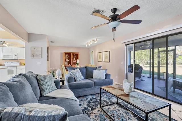 living room with a textured ceiling