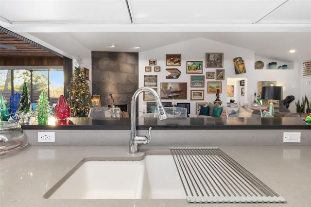 kitchen featuring vaulted ceiling