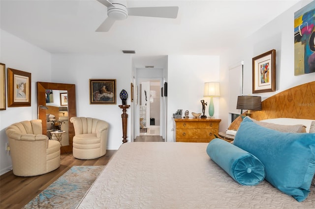 bedroom featuring ceiling fan and hardwood / wood-style floors