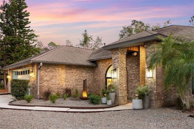 view of front of property with a garage