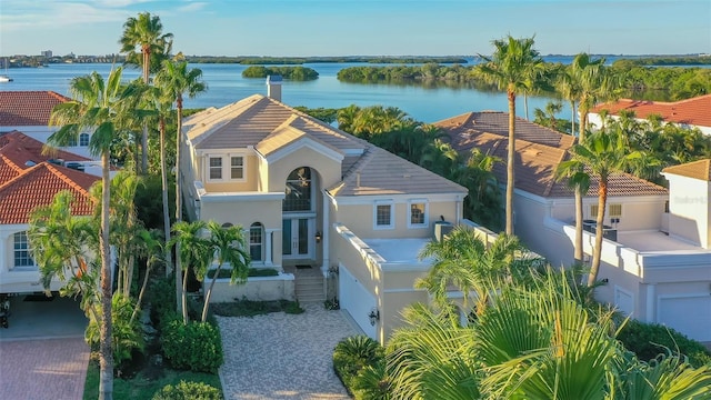 drone / aerial view with a water view