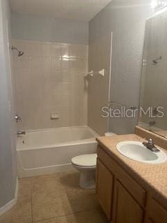 full bathroom with tile patterned flooring, vanity, toilet, and shower / tub combination