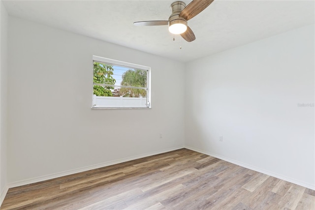 unfurnished room featuring ceiling fan and light hardwood / wood-style floors