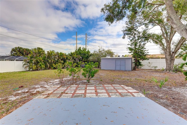 view of patio featuring a shed