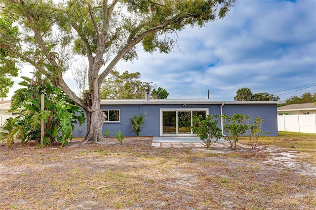 back of house featuring a patio