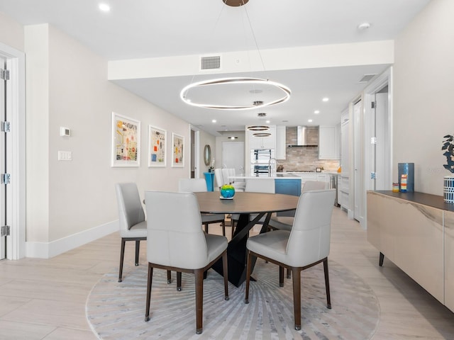 dining space featuring sink