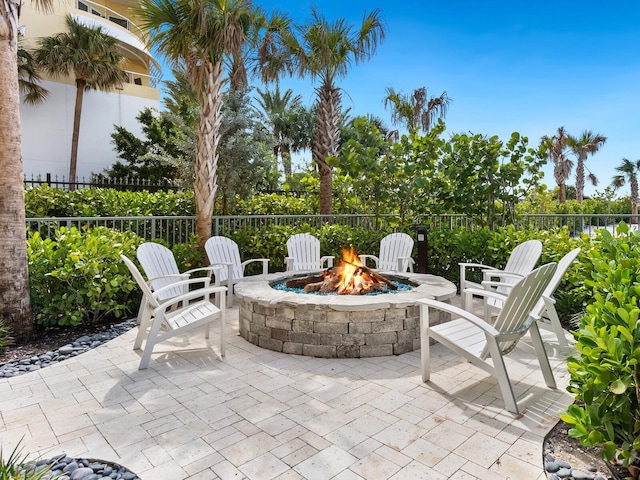 view of patio with an outdoor fire pit