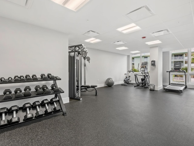 gym featuring a drop ceiling