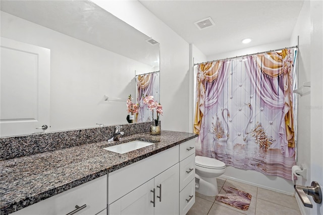 full bathroom featuring tile patterned floors, shower / bath combination with curtain, toilet, and vanity