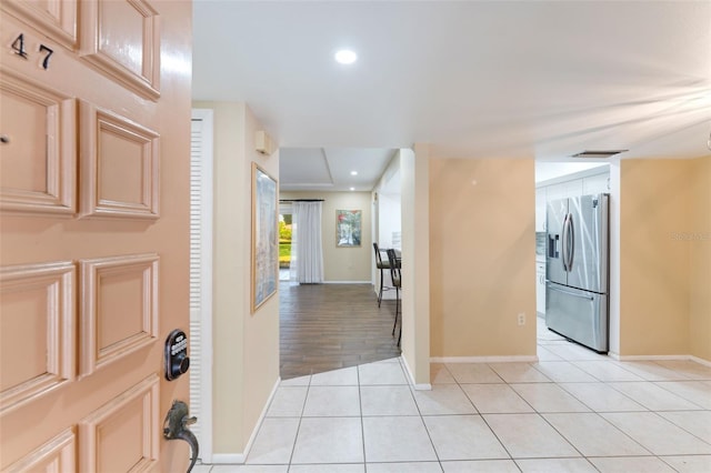 entryway with light hardwood / wood-style flooring