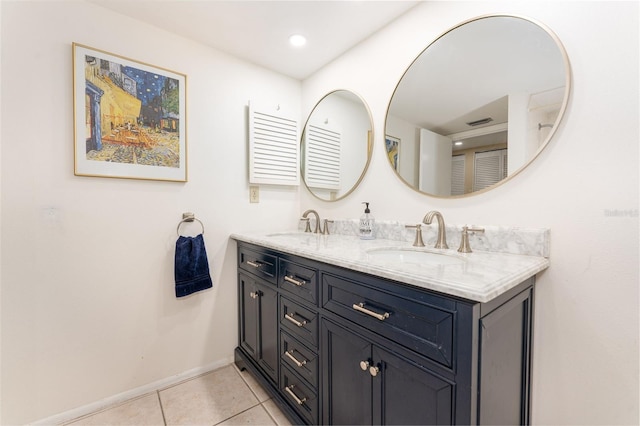 bathroom with vanity and tile patterned floors