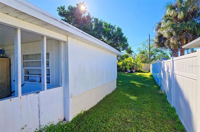 view of home's exterior featuring a lawn