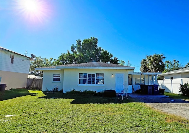 view of front of home with a front yard