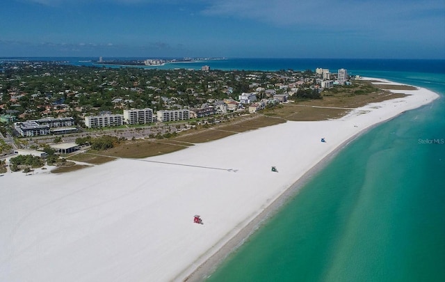 bird's eye view with a view of the beach and a water view