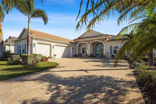 view of front of property with a garage