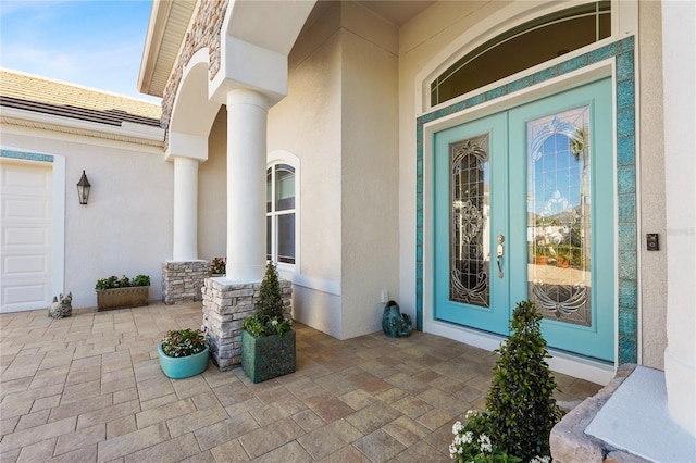 doorway to property featuring french doors