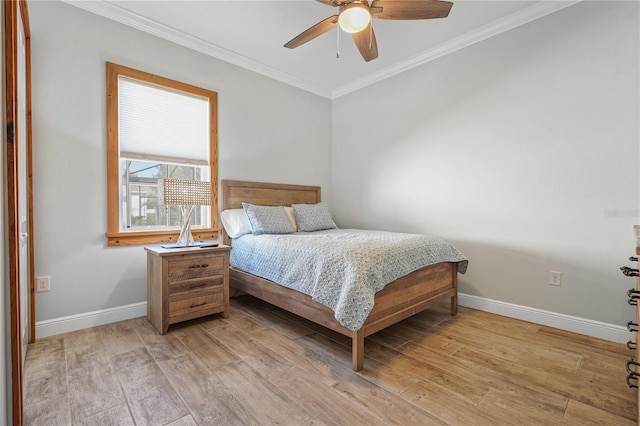 bedroom with ceiling fan, crown molding, and light wood-type flooring