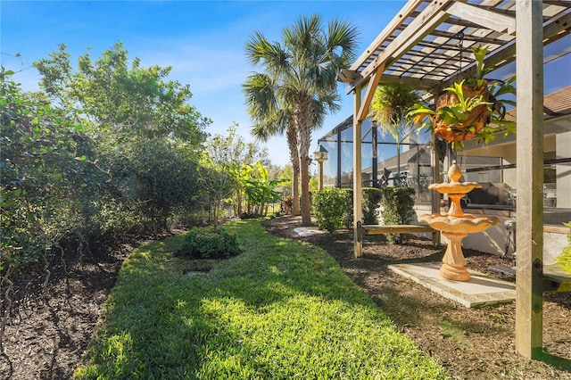 view of yard with a lanai