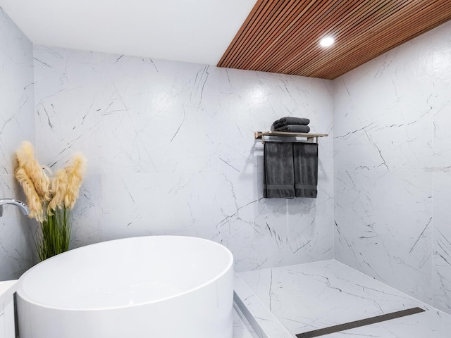 bathroom with a bathing tub