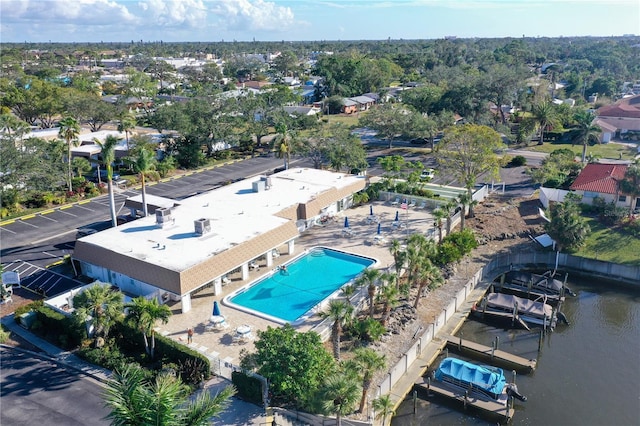 birds eye view of property featuring a water view