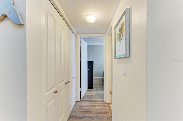 corridor featuring light wood-type flooring