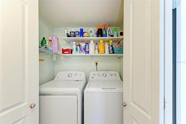 laundry room with independent washer and dryer