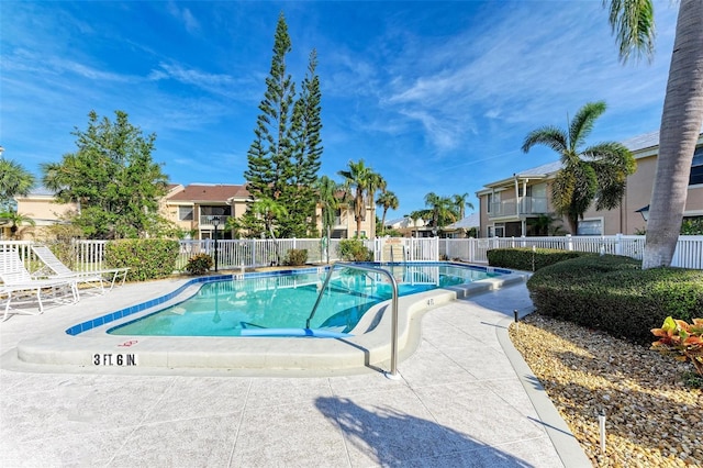 view of pool with a patio area