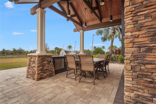 view of patio with exterior kitchen