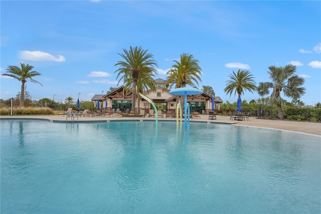 pool with a patio area and a gazebo