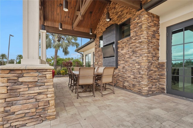 view of patio / terrace featuring outdoor dining area and fence