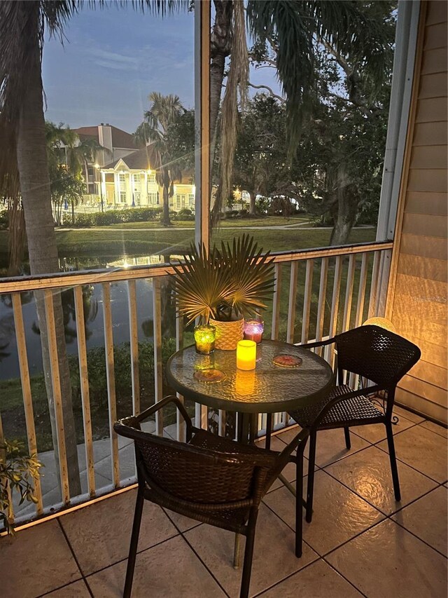 view of balcony at dusk