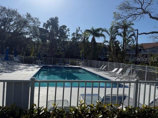 view of swimming pool featuring a patio area