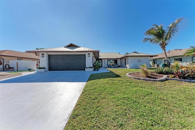 ranch-style house with a garage and a front lawn