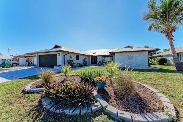 single story home with a front yard and a garage