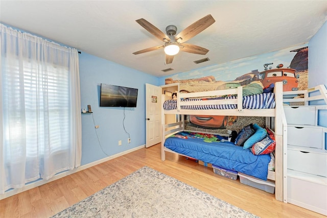 bedroom featuring ceiling fan and hardwood / wood-style floors