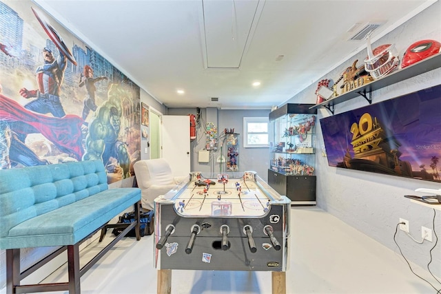 recreation room with concrete floors