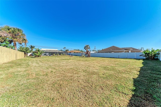 view of yard with a playground