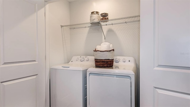 laundry room with washer and clothes dryer