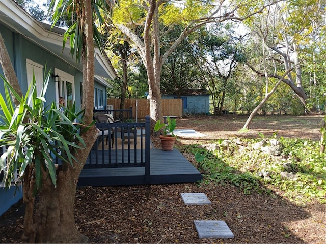 view of yard featuring a deck